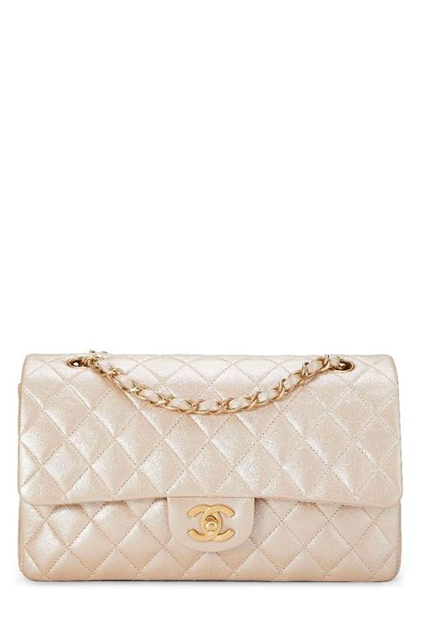 chanel metallic cream quilted leather classic flap medium|Chanel 2.55 flap bag.